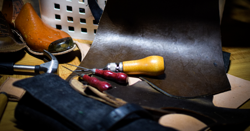 leather scraps and tools