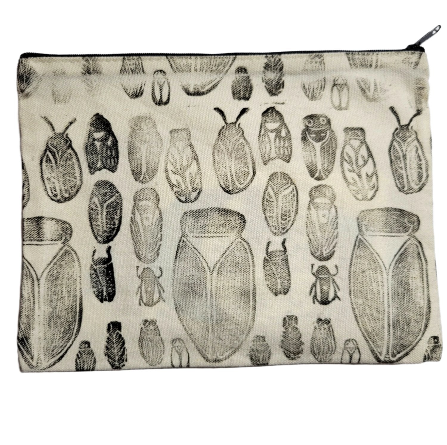 A large canvas coin pouch with black cicadas printed all over it.