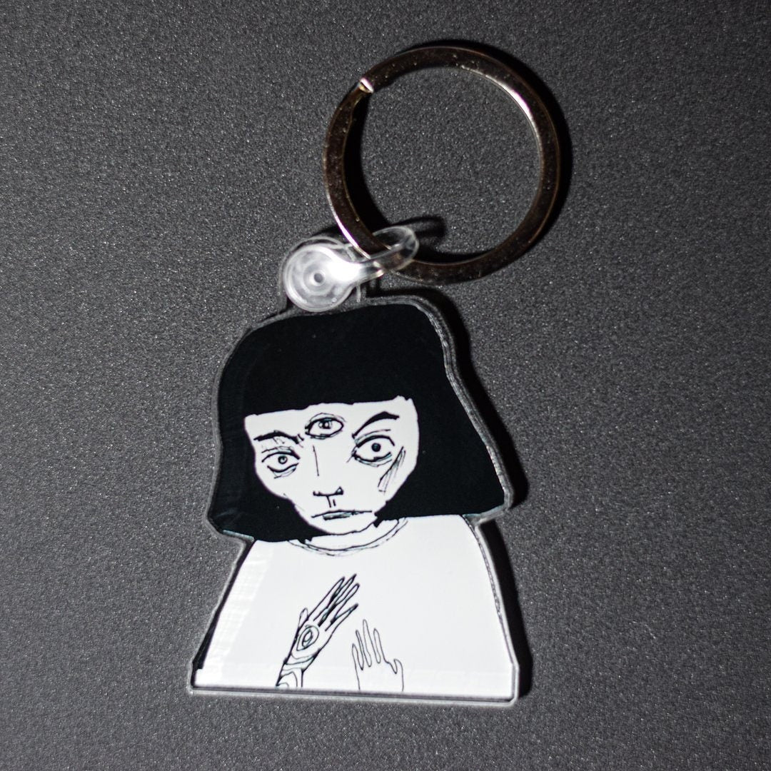 Stange Girl Keychain