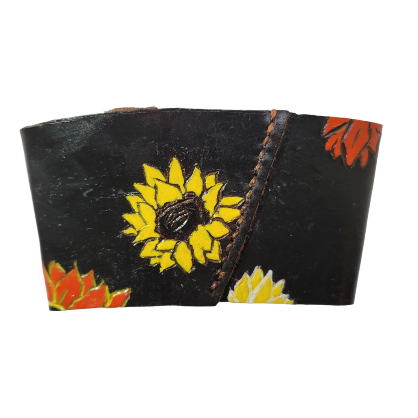 Leather coffee sleeve with sunflowers printed on it